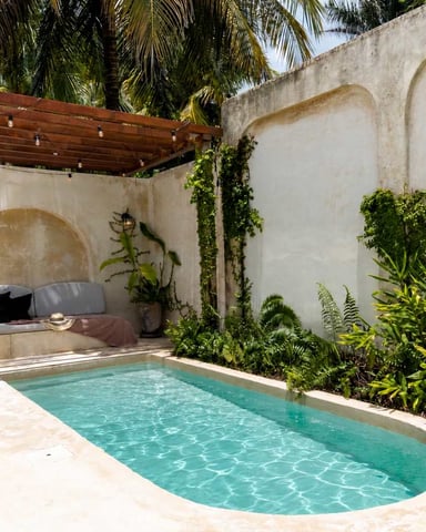 Villa Cayetana pool with pergola and string lights at dusk